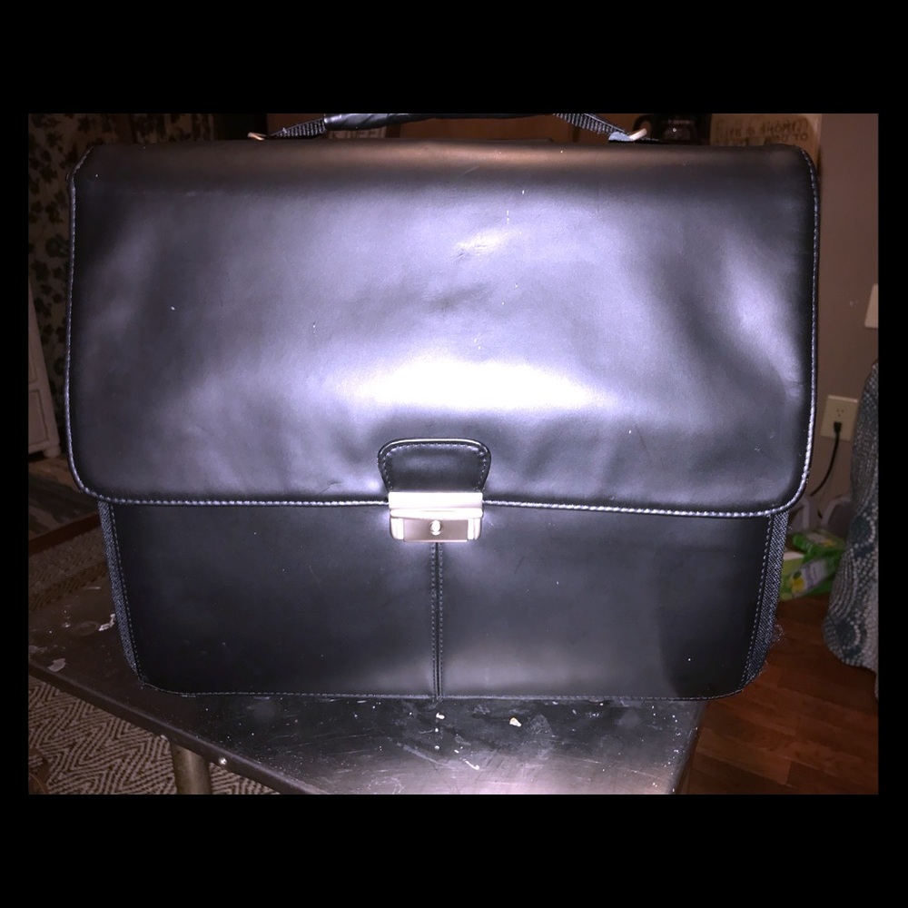 Wilson’s leather rolling briefcase