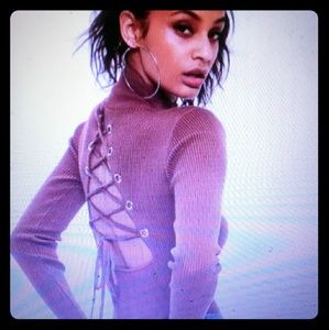 ISO !!! MISSGUIDED PINK LACE UP BODYSUIT