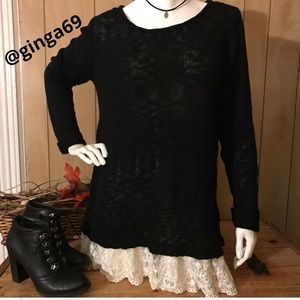 Sweater black sheer with lace at the bottom.