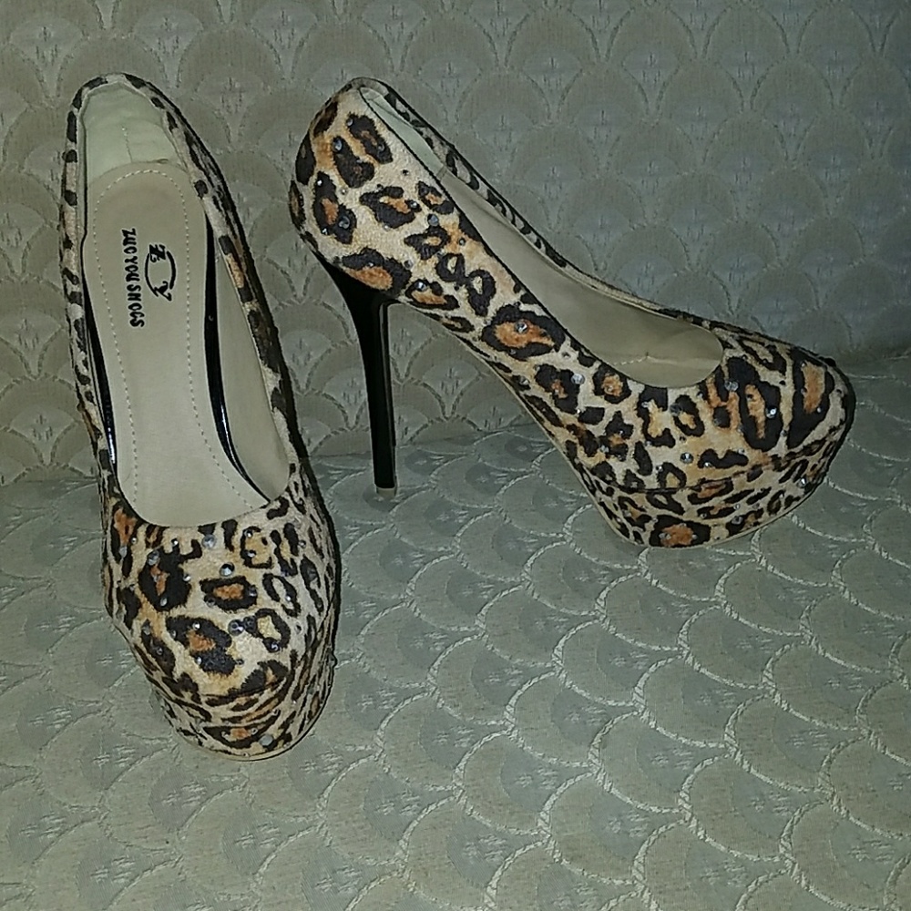 Leopard print and gemed platform pump heels
