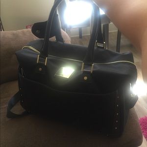 Vince Camuto duffle bag. Airplane carry on size