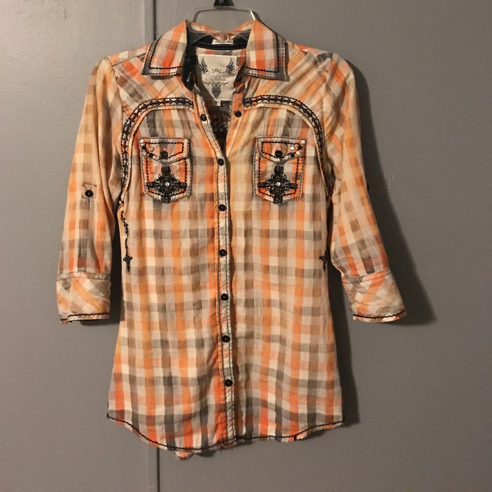 Small Roar brand button up shirt.