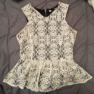 White lace with black undertone sleeveless blouse