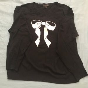 Black sweater w/ white bow ribbon