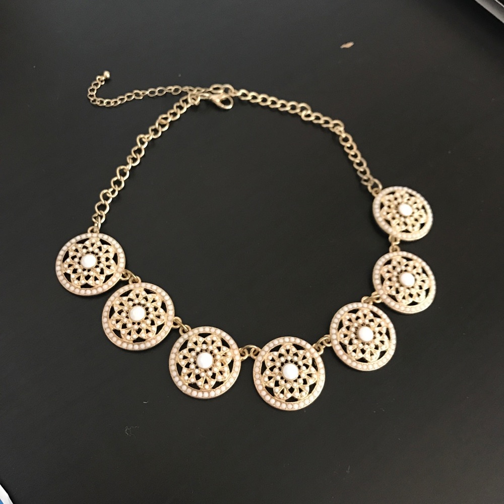Beaded circle necklace.