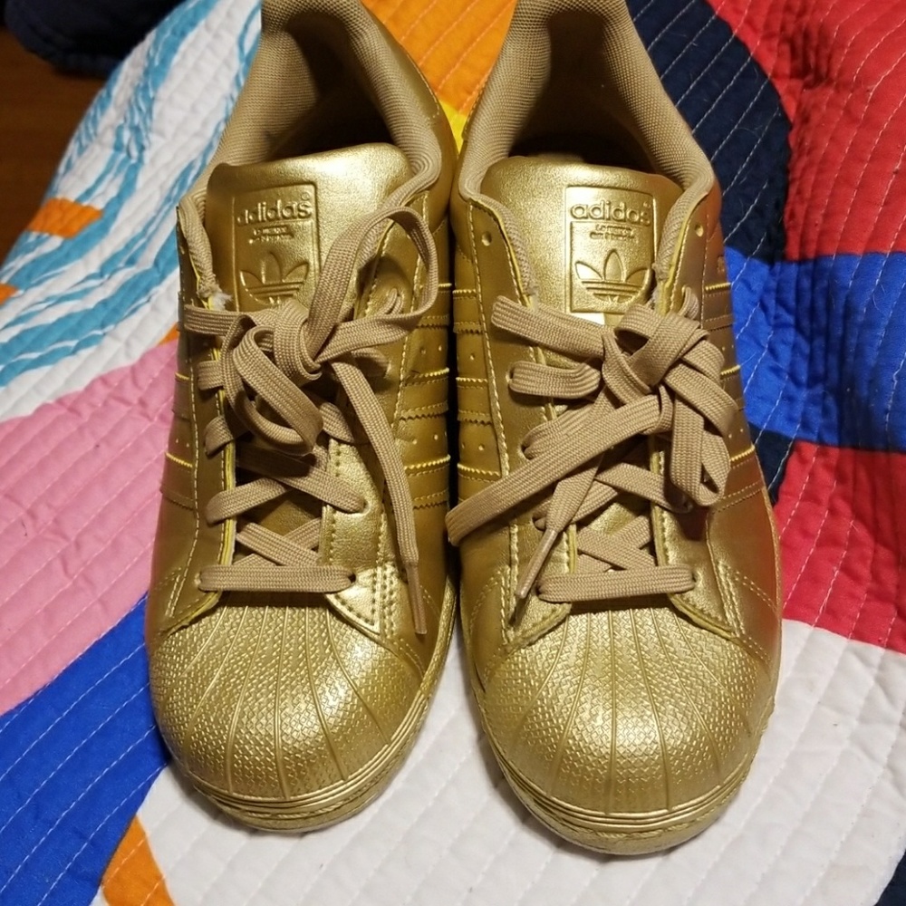 Ladies Gold Adidas superstars size 7
