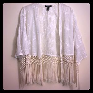 Lace cover with fringe