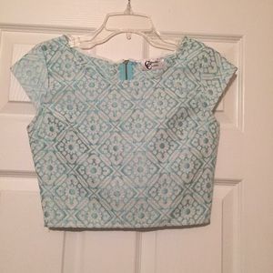 Light blue crop top: zipper in back
