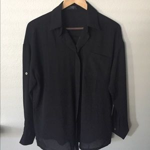 Black long-sleeved blouse, medium