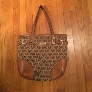Authentic Michael Kors tan leather trimmed purse