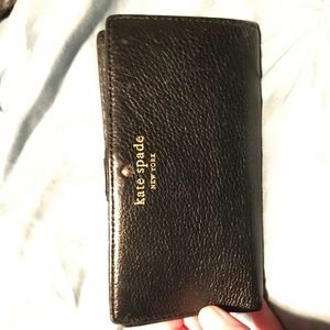 Kate Spade black leather wallet.