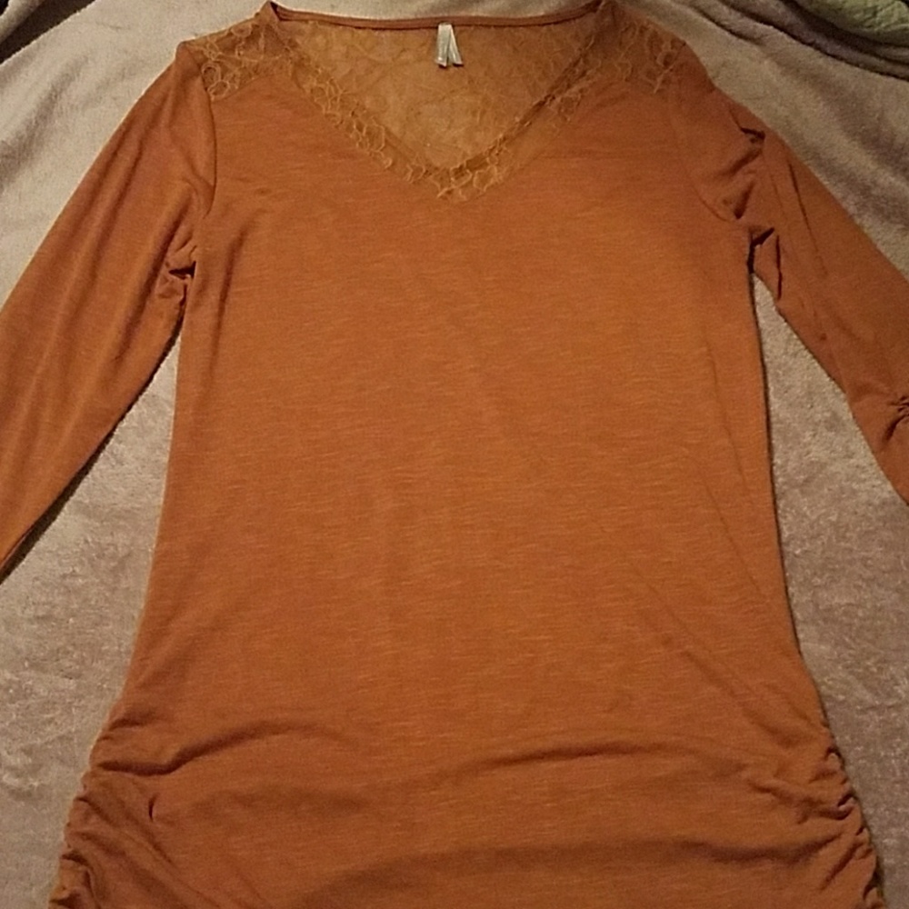 Lace back long sleeve shirt.