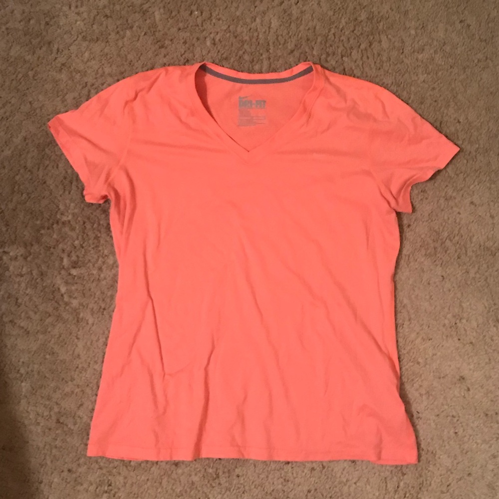 Peach nike shirt