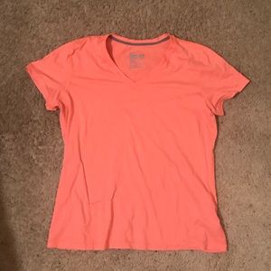 Peach nike shirt