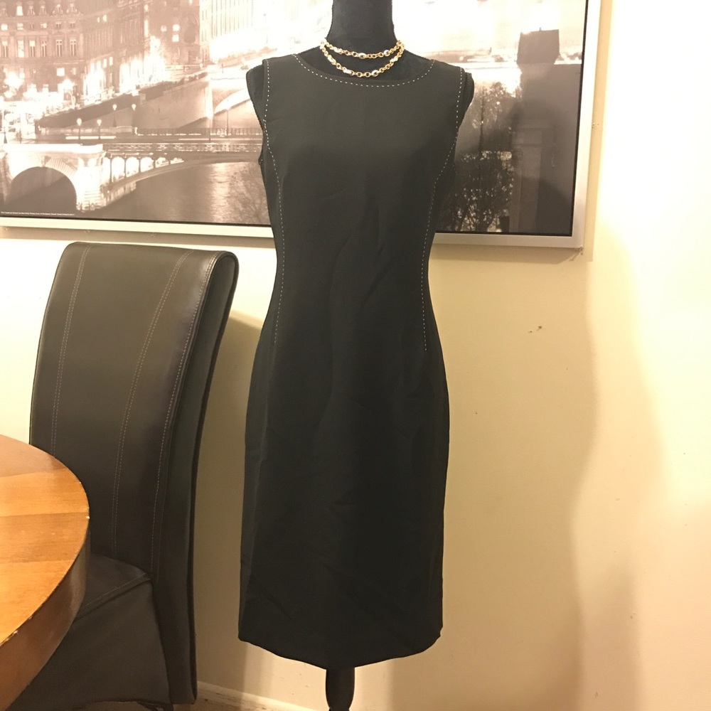 Elegant short black dress by Causal Corner size 6