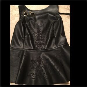 Stylish Black leather-looking top size Large.