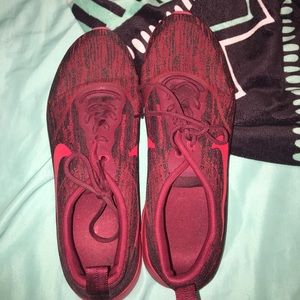 red and black nike’s
