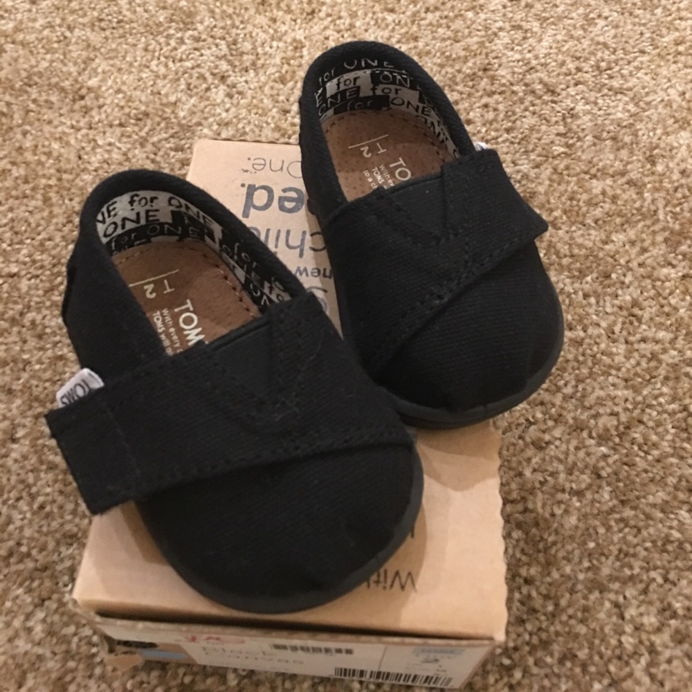 Toms Black Canvas size 2 shoes.