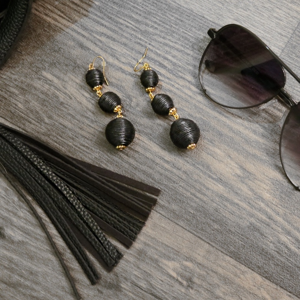 Black & gold Pom Pom dangle earrings