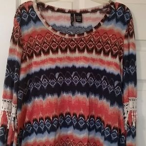 New Directions orange and blue top.