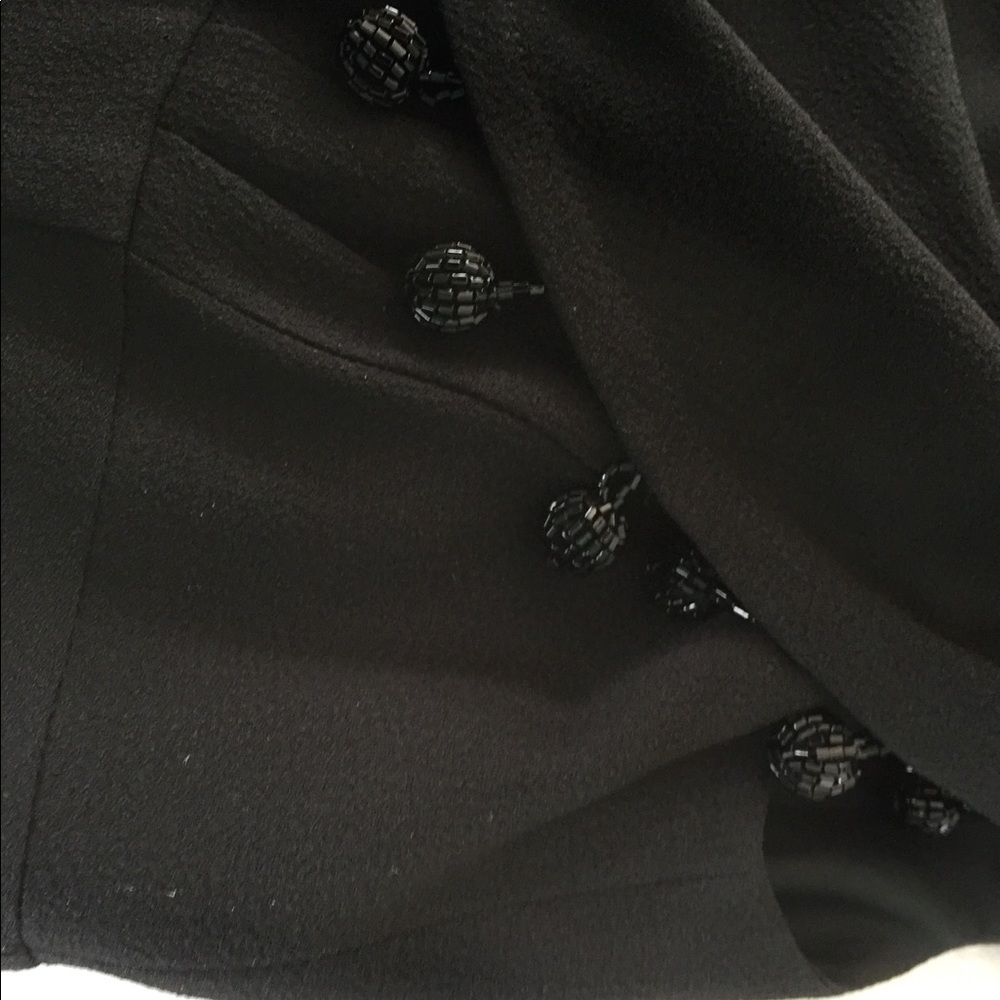 This is a Nanette Lepore size 2 black dress. - Picture 8 of 8
