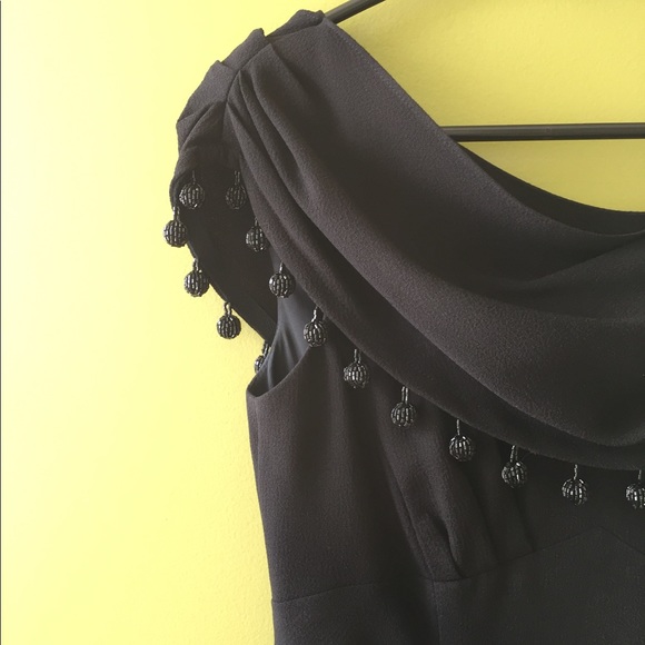 This is a Nanette Lepore size 2 black dress. - Picture 2 of 8