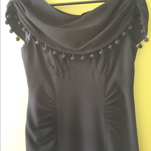 This is a Nanette Lepore size 2 black dress. - Picture 4 of 8