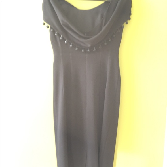 This is a Nanette Lepore size 2 black dress. - Picture 6 of 8