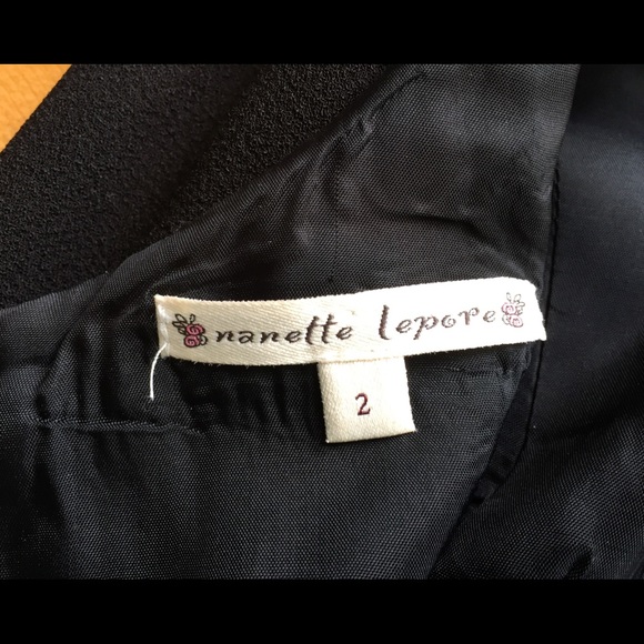 This is a Nanette Lepore size 2 black dress. - Picture 7 of 8