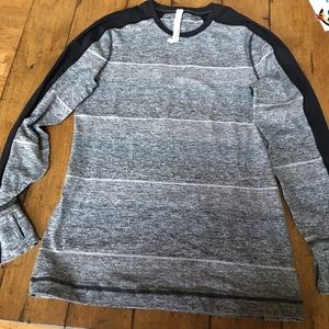 Lululemon men’ slong sleeve shirt. Never worn.
