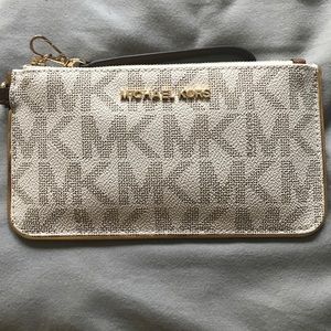 Michael Kors wristlet still in box!