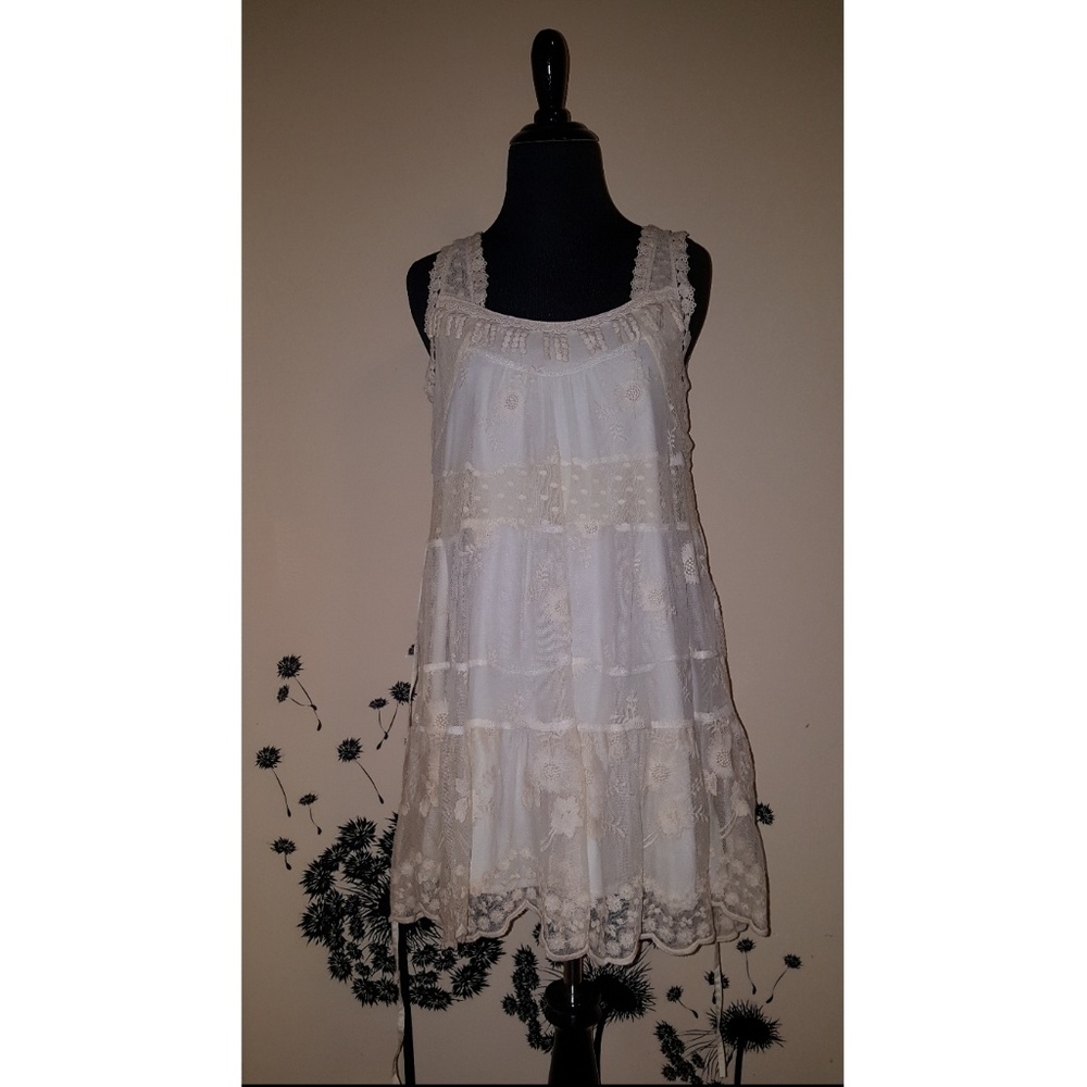 Adorable cream-colored lace dress