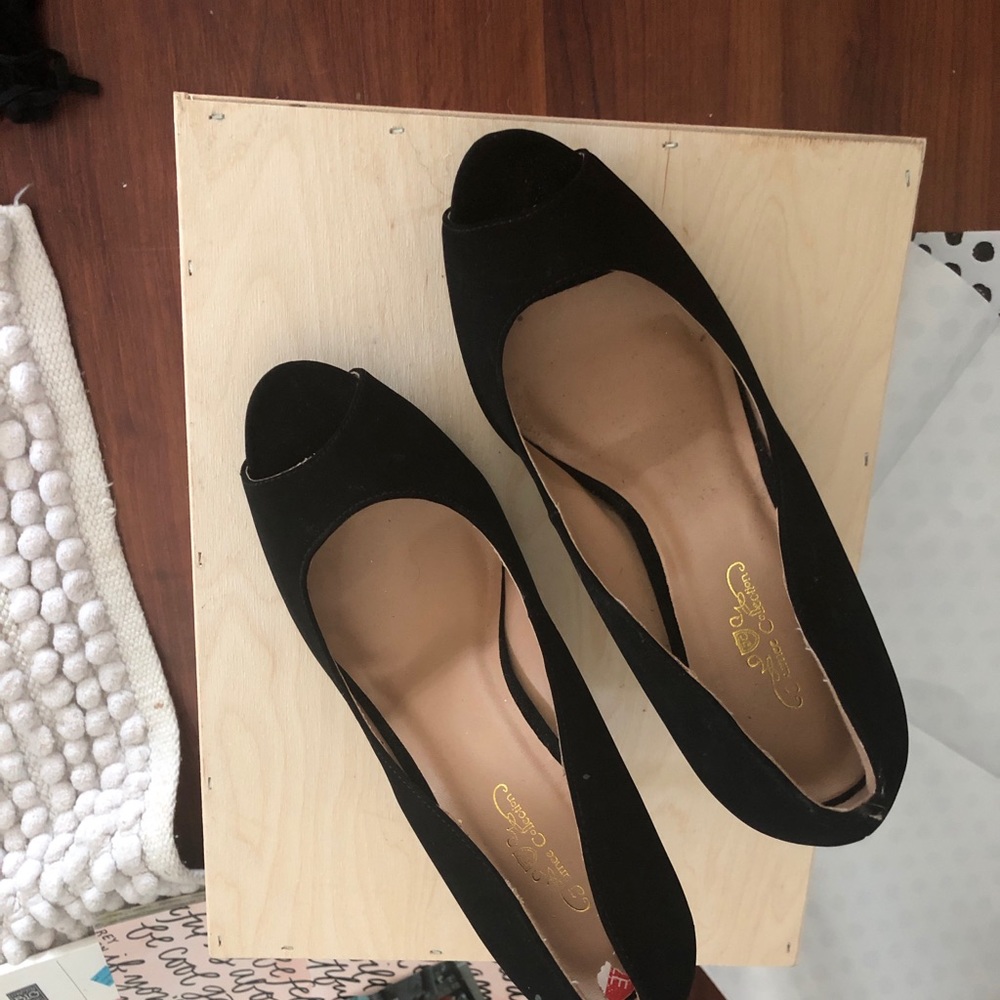 Black suede pumps