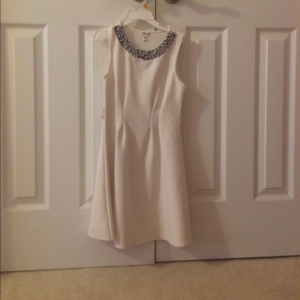 A lovely white dress that is great for church.