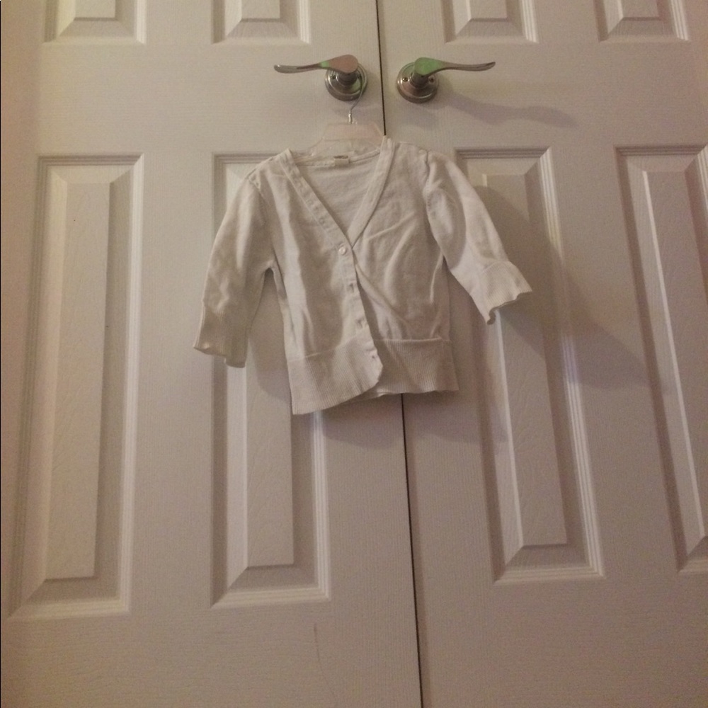 This is a lovely little white sweater.