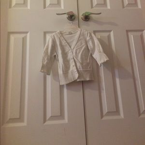 This is a lovely little white sweater.