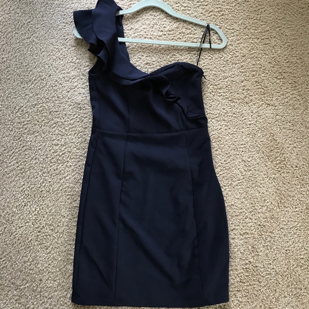 Navy blue cocktail dress with sweetheart neckline.