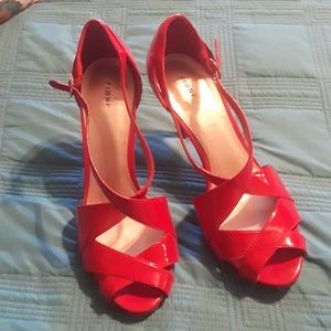 Red Pantent heals. Open toe size 9