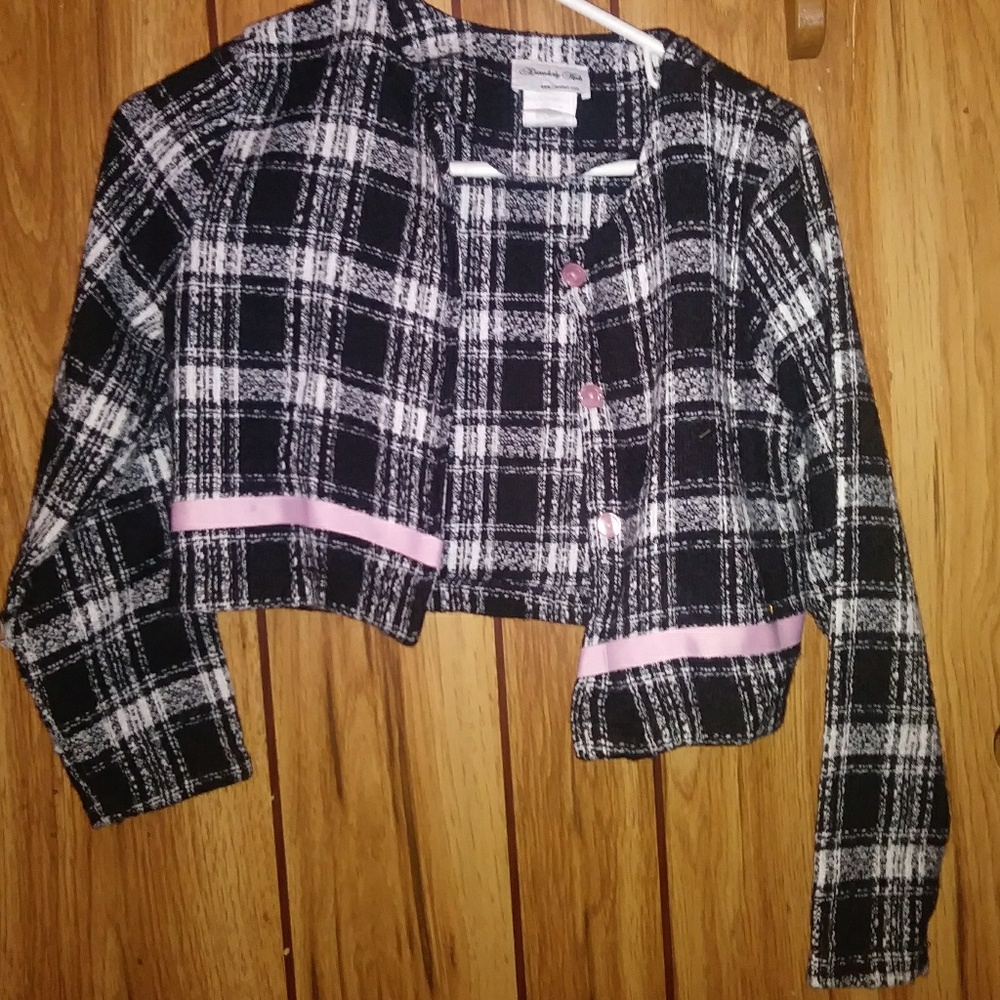 Coat with pink ribbon