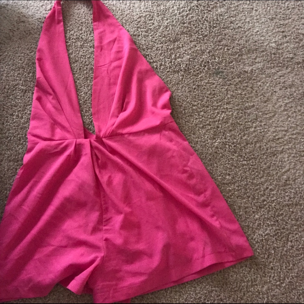 Short hot pink jumpsuit.
