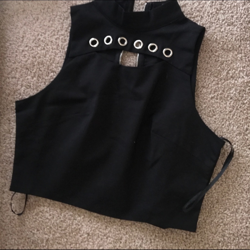 Black half top , with zipper up in the back