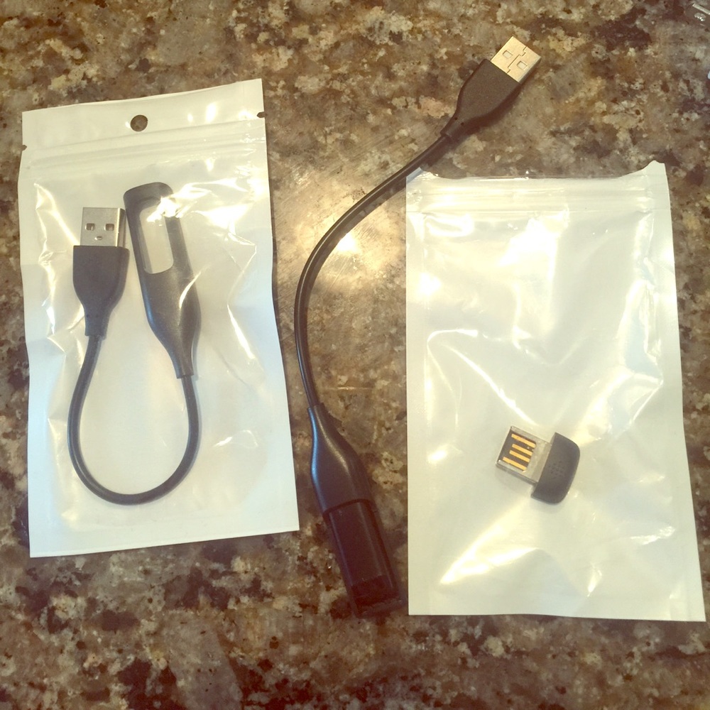 FitBit tracker with two charges and sync cable