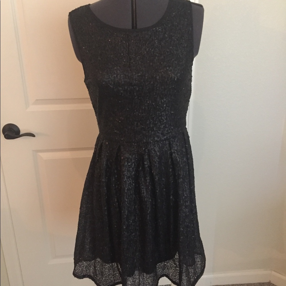 Black and black small sequins dress size med.