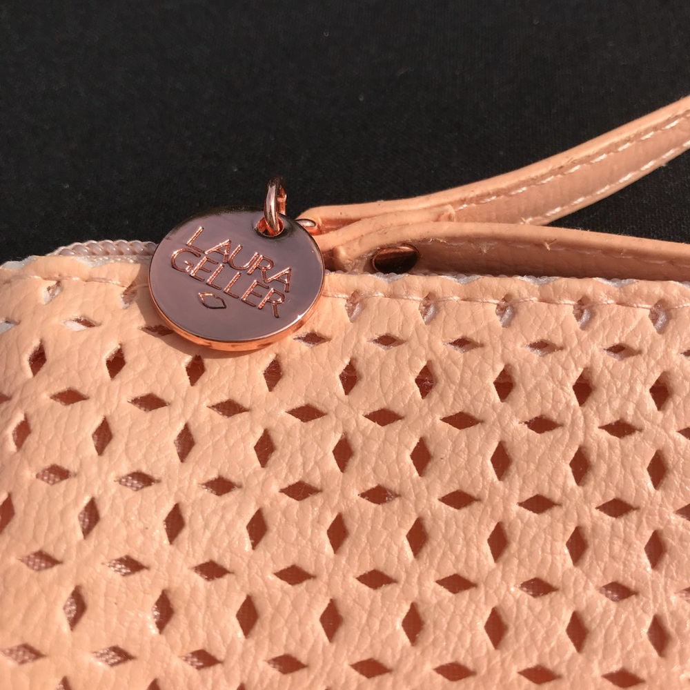 LAURA GELLAR Wristlet. Perforated design. Unused.