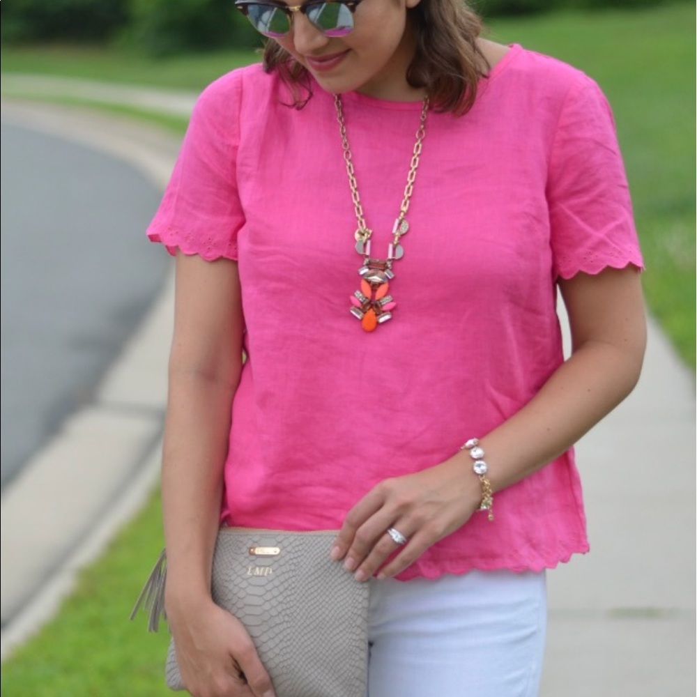 Scalloped open back top.