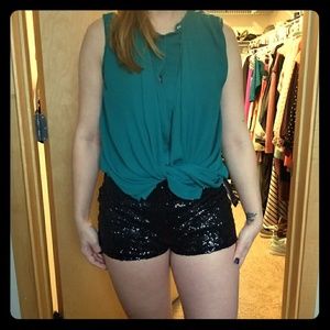 Black sequin mini shorts