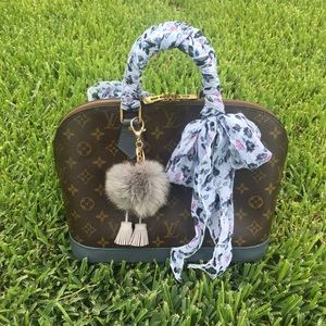Authentic Louis Vuitton Alma- grey