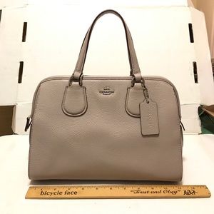 Coach Nolita Satchel with cross body strap.