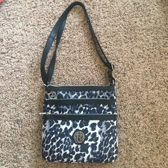 Relic Handbags - NWOT Relic Crossbody Animal Print. Faux leather.
