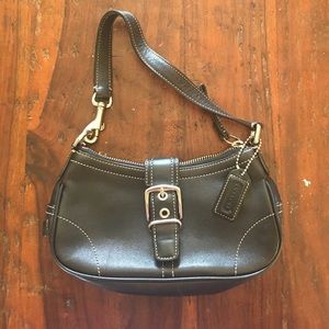 Black mini coach clutch